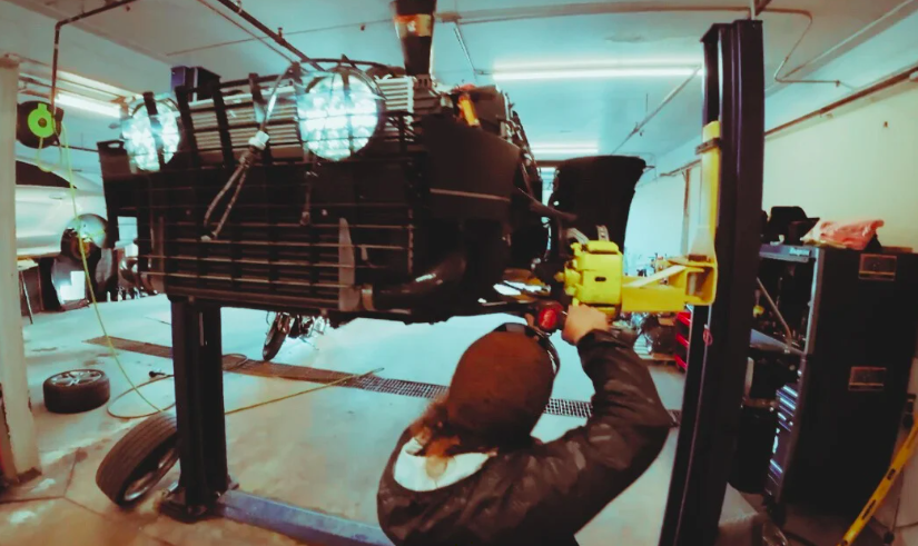 Technician repairing Vanderhall